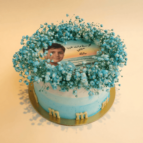 كيك عيد ميلاد أزرق مع طباعه صوره