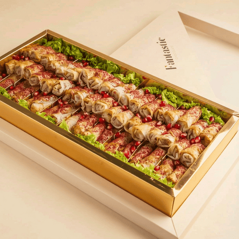 Combo 2 — Half & Half Box — Musakhan Rolls & Peanut Cream Caramel Belgian Chocolate
