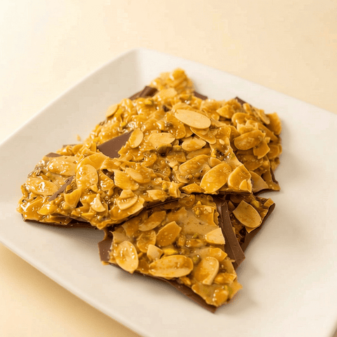 Crunchy Almonds Slices Layered with Milk Chocolate