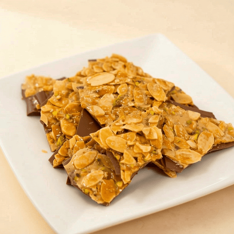 Crunchy Almonds Slices Layered with Milk Chocolate