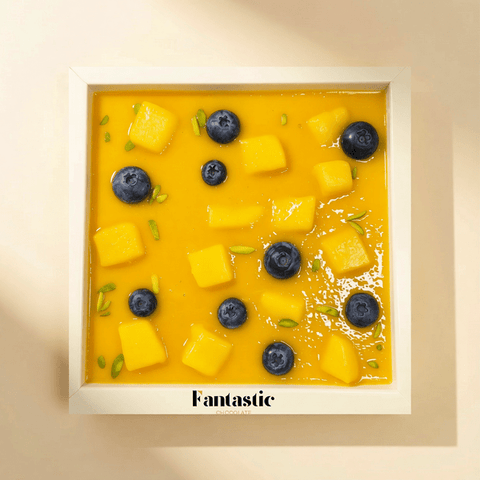Delicious Mango Ice Cream Cake with Vanilla Cake Layers