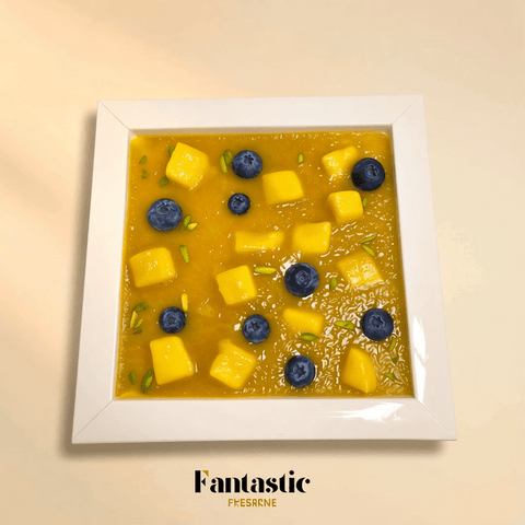 Delicious Mango Ice Cream Cake with Vanilla Cake Layers