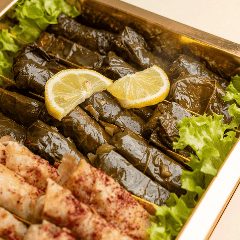 Deluxe Mediterranean Sampler: Grape Leaves & Musakhan Bites