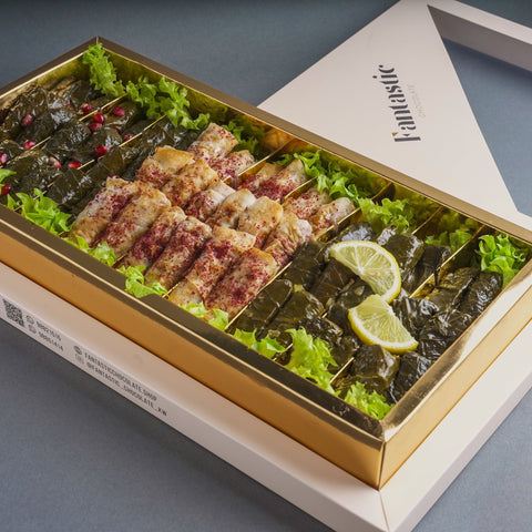 Deluxe Mediterranean Sampler: Grape Leaves & Musakhan Bites