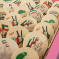 Kuwait National Days Cappuccino Chocolate Logo