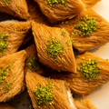 Mabrouma with Cream and Crunchy Pistachio