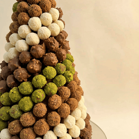 Mini truffle chocolate tower with nutella, pistachio, raffaello and kinder bueno truffles