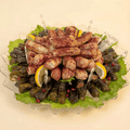 Mixed Savory Platters of Grape Leaves, Musakhan, Kubbeh, Samosa