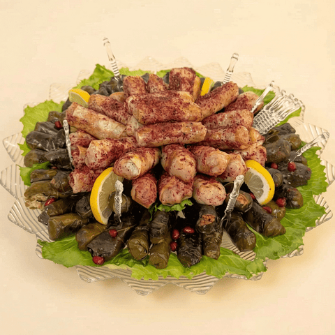 Mixed Savory Platters of Grape Leaves, Musakhan, Kubbeh, Samosa