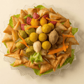 Mixed Savory Platters of Grape Leaves, Musakhan, Kubbeh, Samosa