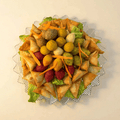 Mixed Savory Platters of Grape Leaves, Musakhan, Kubbeh, Samosa