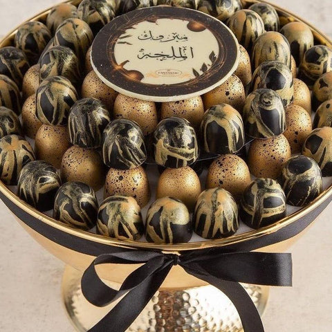 Round Gold Tray of Black and Gold Marble Chocolate