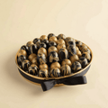 Round Gold Tray of Black and Gold Marble Chocolate