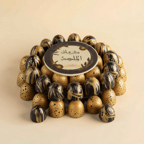 Round Gold Tray of Black and Gold Marble Chocolate