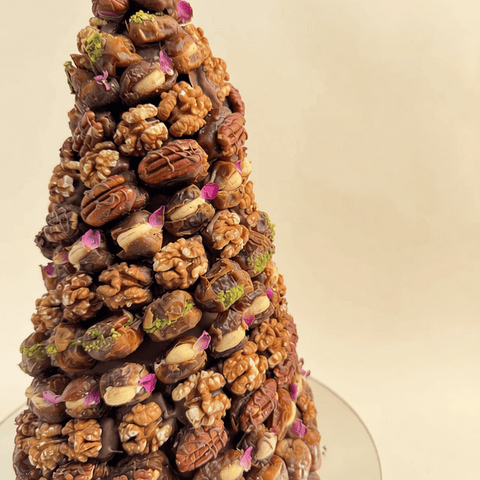 Close view of sukkari dates stuffed with pistachio and walnut
