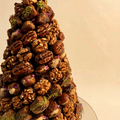 Sukkari dates stuffed with nuts arranged as a tower for occasions