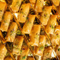 Deluxe Znoud El Sitt: Cream & Pistachio Stuffed Phyllo Rolls