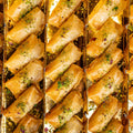 Deluxe Znoud El Sitt: Cream & Pistachio Stuffed Phyllo Rolls