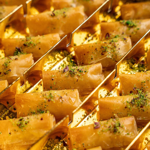 Deluxe Znoud El Sitt: Cream & Pistachio Stuffed Phyllo Rolls